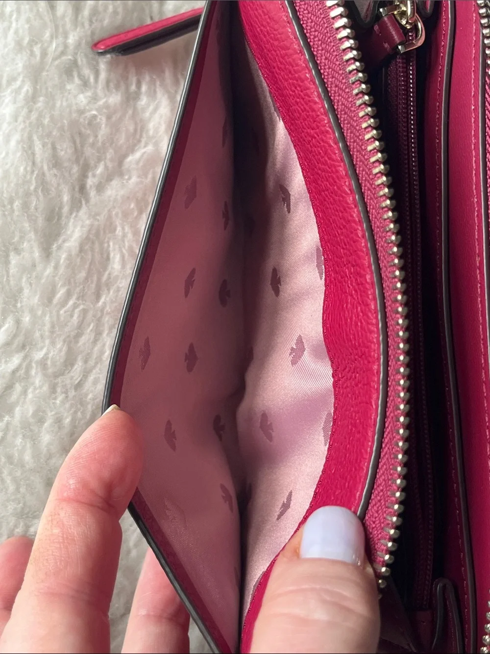 kate spade raspberry pebbled leather zip-around wallet